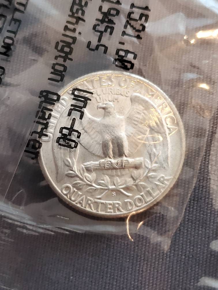 1945s earlier date silver Washington quarter choice uncirculated in Littleton plastic