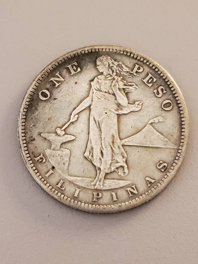 1907s or 1908s from collection Phillipines silver peso large silver coin