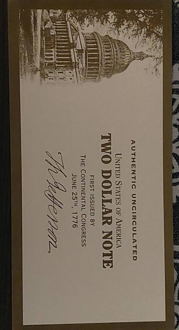 Uncirculated 2 dollar bill holder and coa, lovely percent condition unused 2 dollar bill