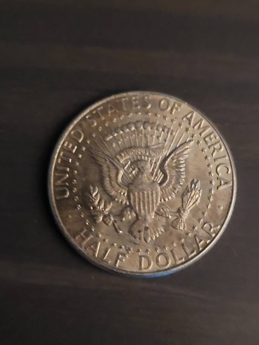 1964 Kennedy 90% silver half dollar high grade