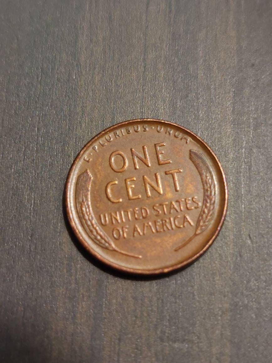 1909p Lincoln wheat cent, first year old issue almost uncirculated