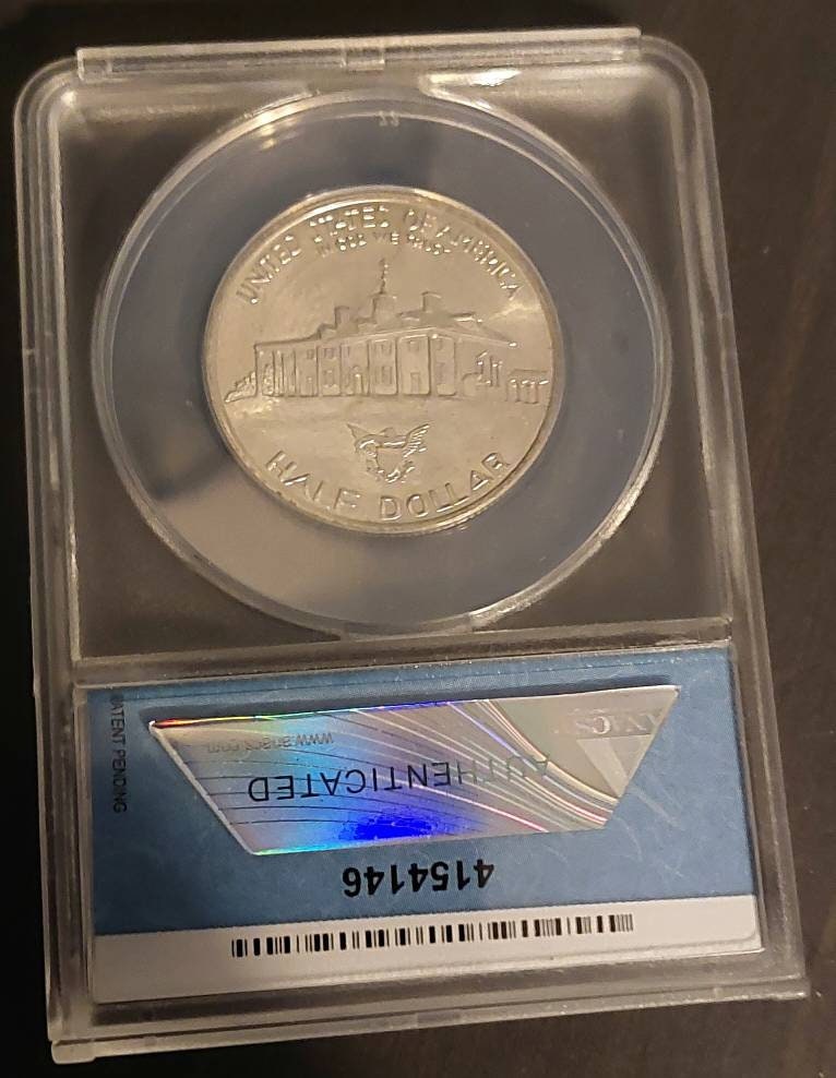 1982d Washington 50 cent commemorative silver coin, anacs graded ms67
