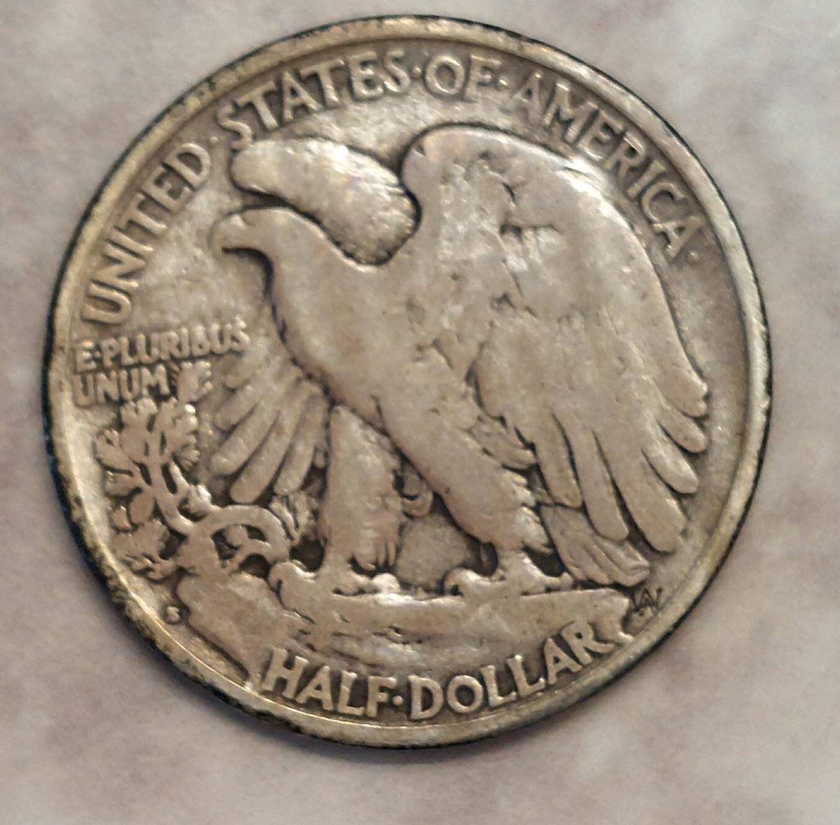 1927s walking liberty half dollar, Scarce better date low mintage in very good condition