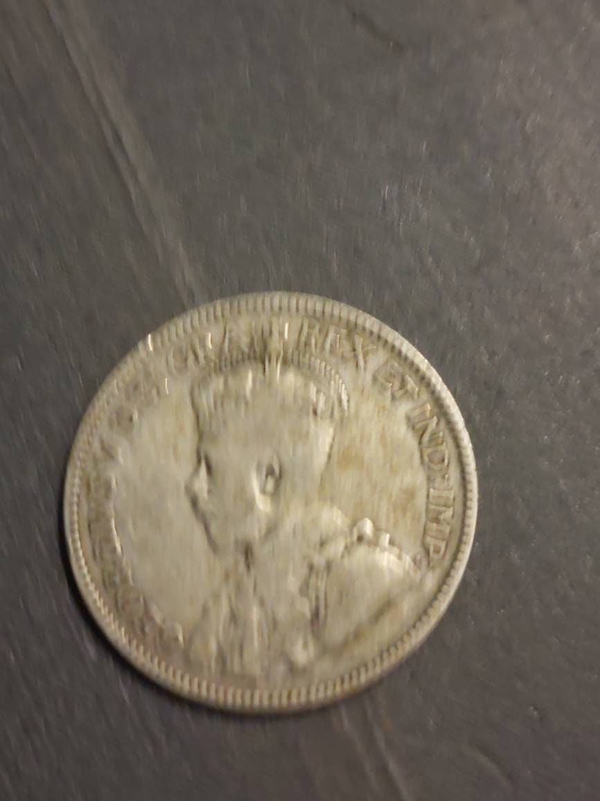 1933 and 1939 king george silver Canadian quarter set.