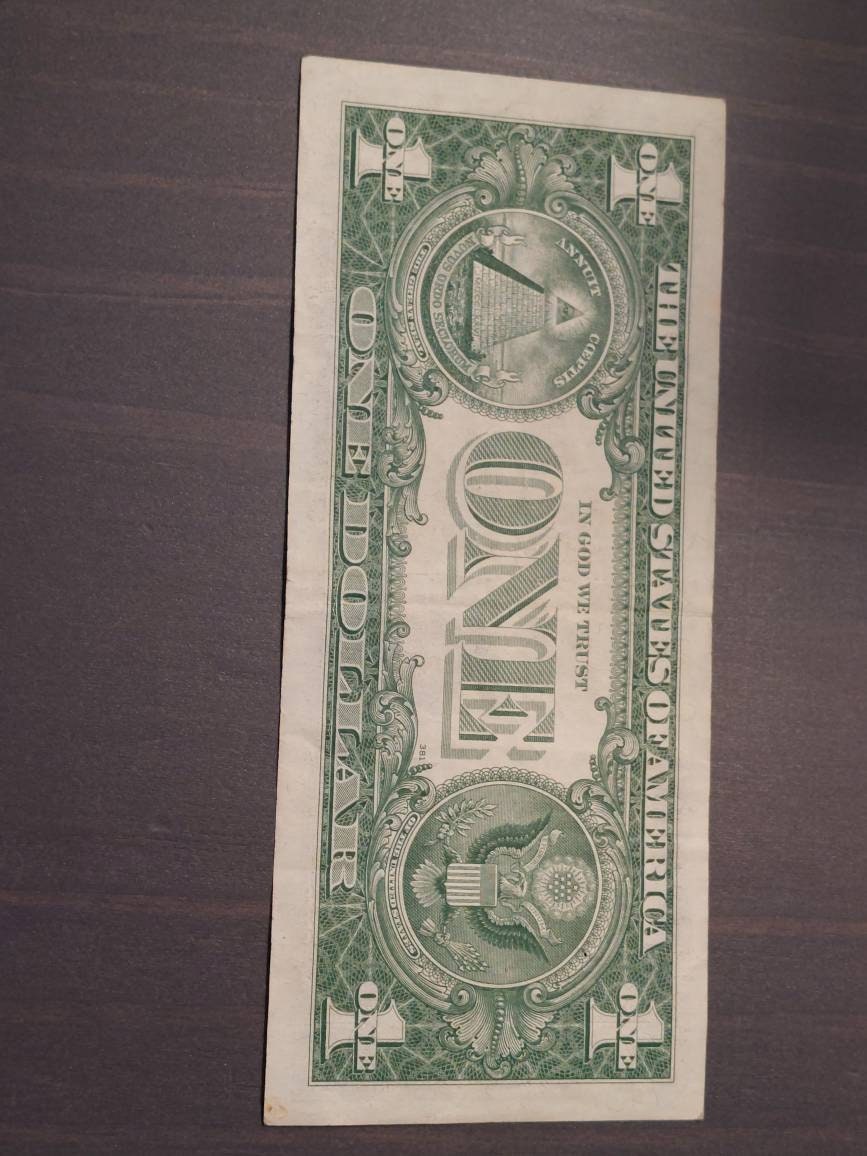 1957a one dollar silver certificate, high grade blue seal STAR note American currency