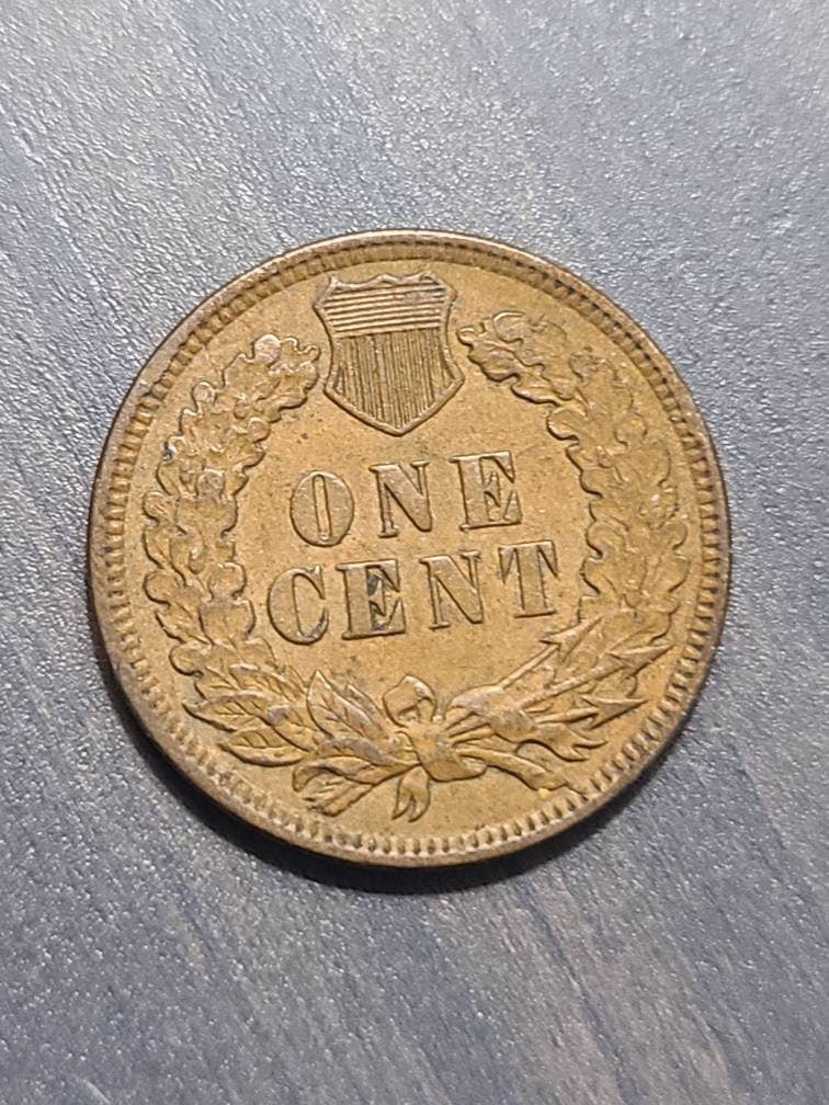 1906 indian head penny, almost uncirculated, beautiful antique American coin