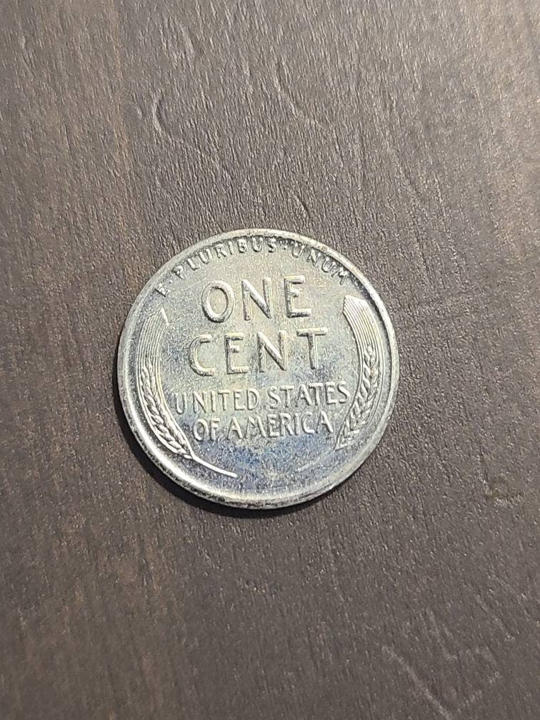 1943s true uncirculated steel penny, rare this nice, one year war coin