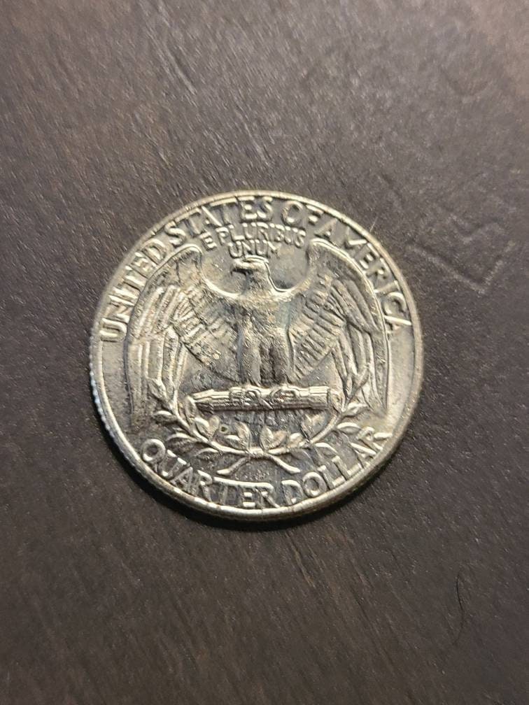 uncirculated Washington Silver Quarter coin, one uncirculated 1950s-1960s date mint state 90 percent silver quarter dollar, coin collecting