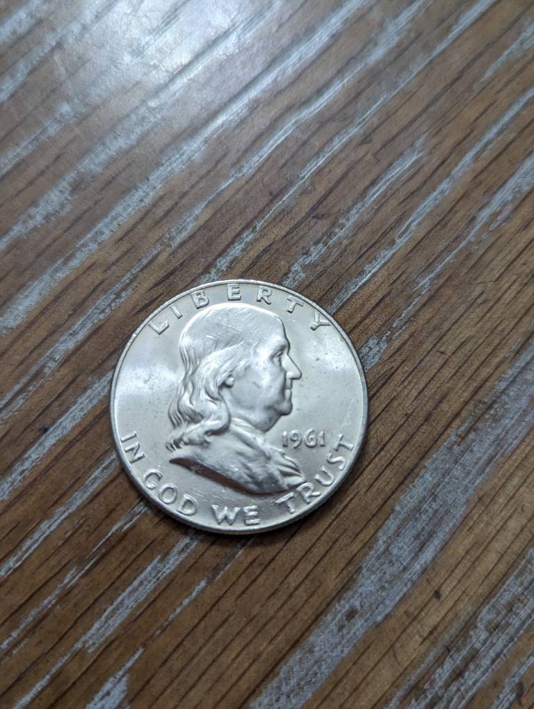 Rainbow toned 1961d beautiful UNC Ben Franklin silver half dollar, 90 percent silver American coin collecting