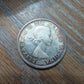 Mint state Canada silver rainbow toned dollar canoe coin