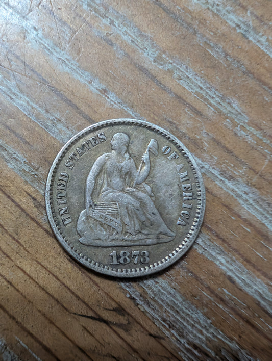 1873 beautiful silver half dime coin