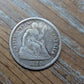 Lovely 1869 silver half dime coin