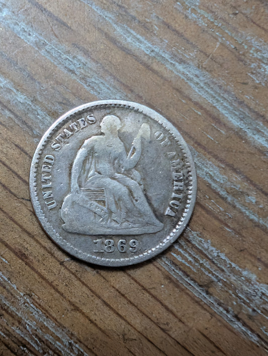 Lovely 1869 silver half dime coin