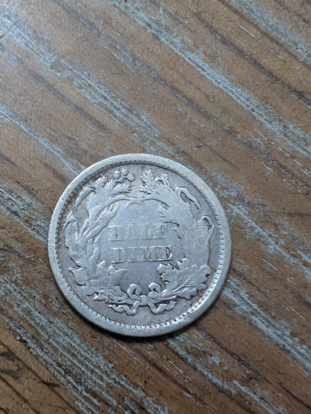 Lovely 1869 silver half dime coin