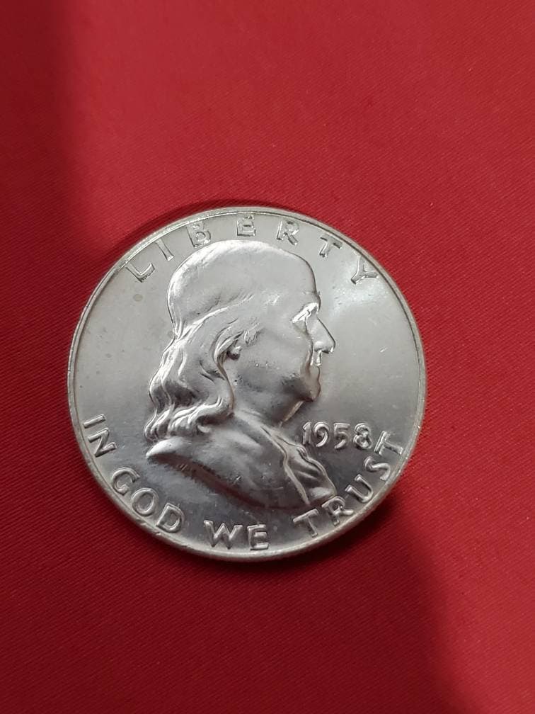 1958d original rolled franklin half dollar beautiful uncirculated