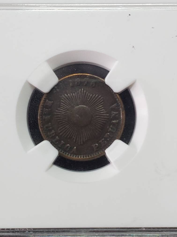 Peru 1875 1 centavo ngc graded foreign copper cent