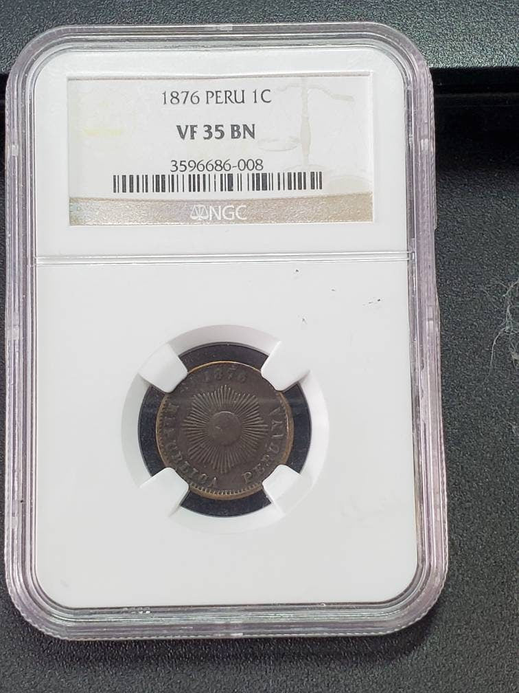 Peru 1875 1 centavo ngc graded foreign copper cent