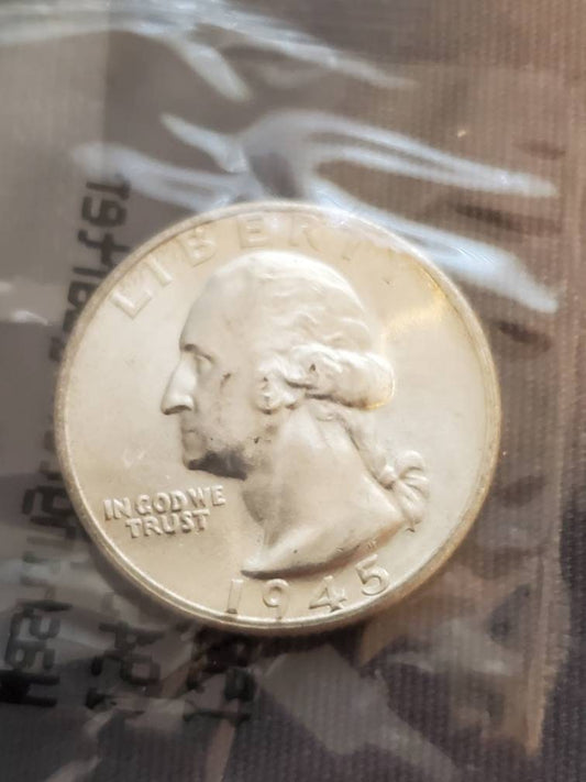 1945s earlier date silver Washington quarter choice uncirculated in Littleton plastic