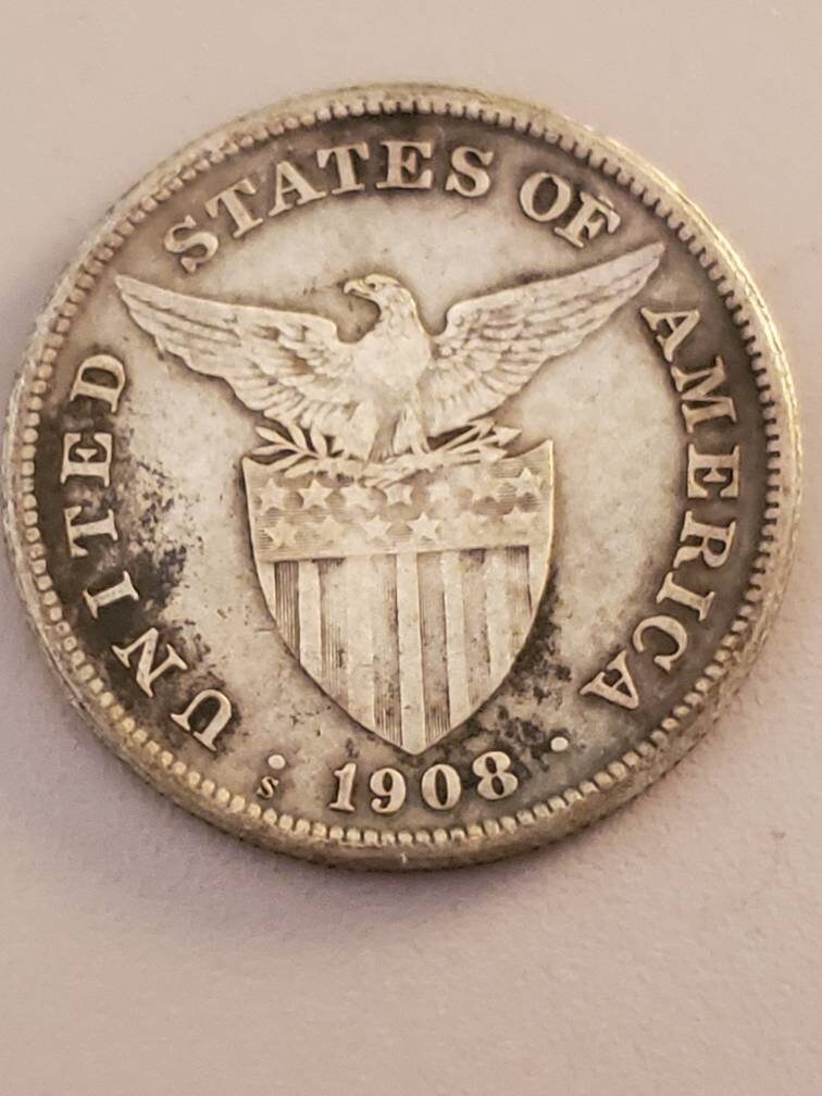 1907s or 1908s from collection Phillipines silver peso large silver coin