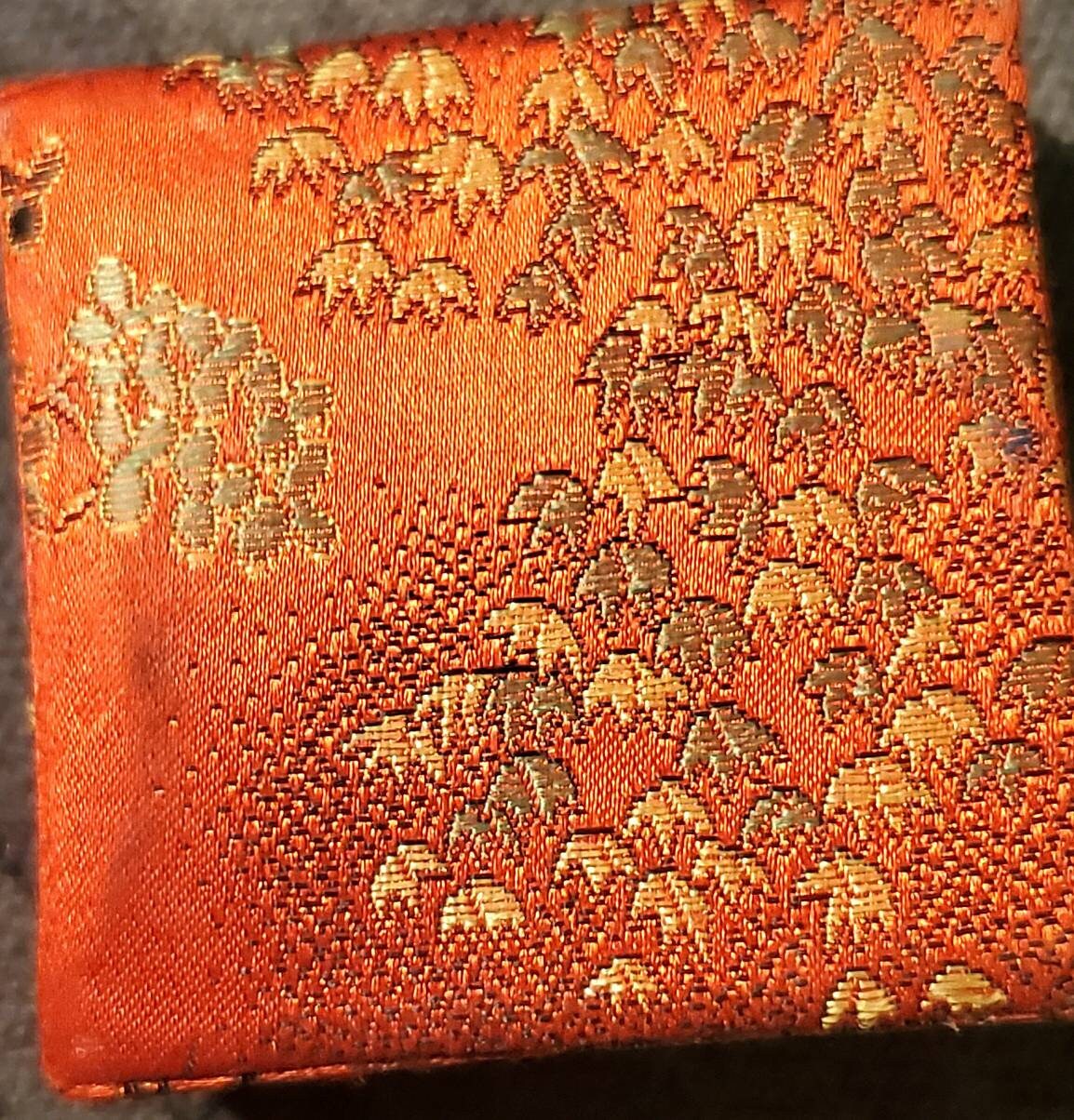 Chinese gilded medal token in souvenir fabric red box