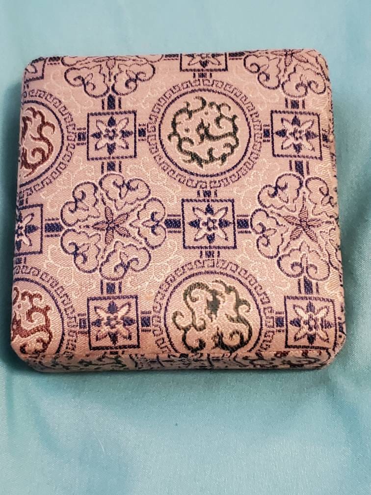 Chinese large gilded token in fabric box