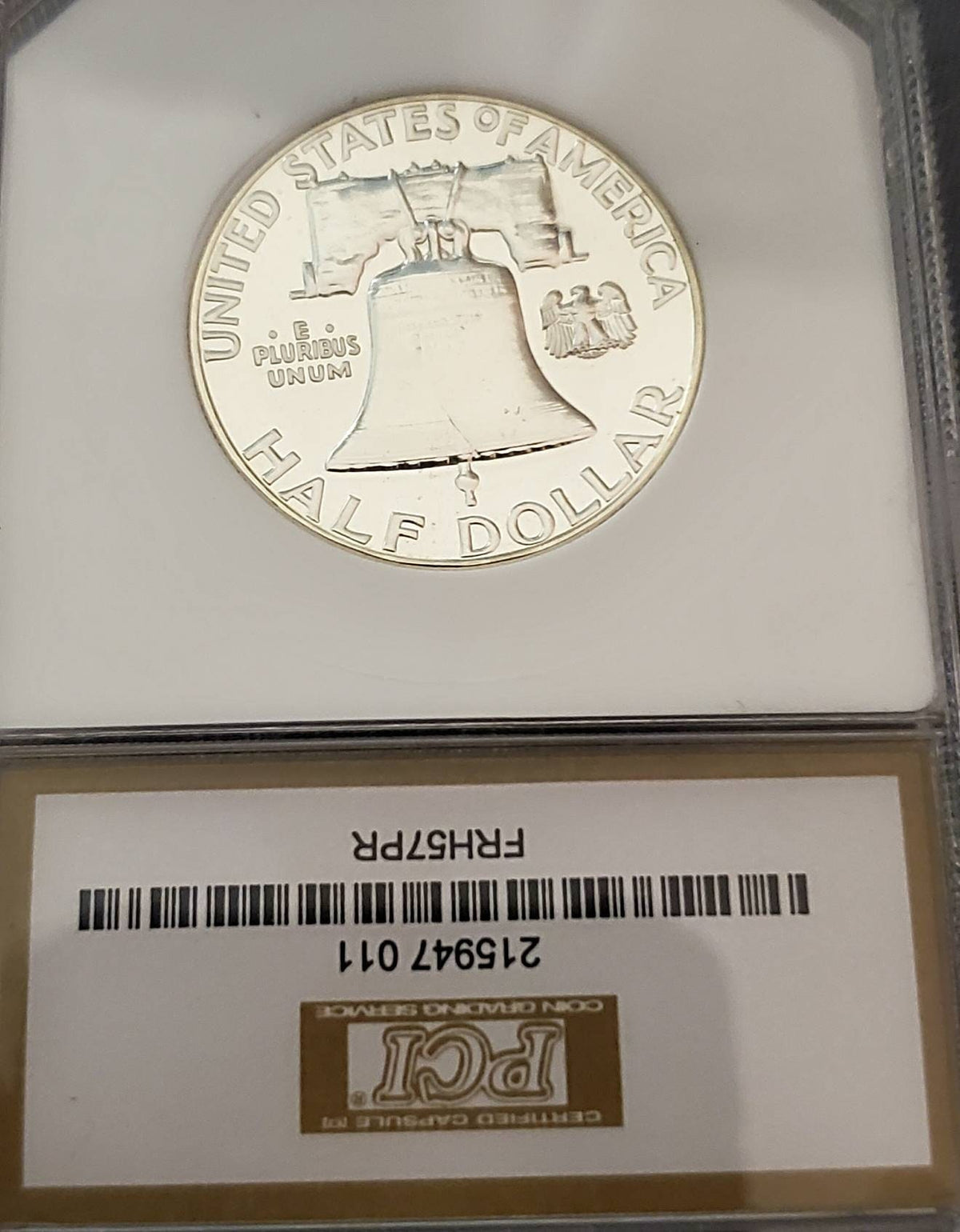 1957 proof silver Franklin half, pci graded proof66, looks undergraded