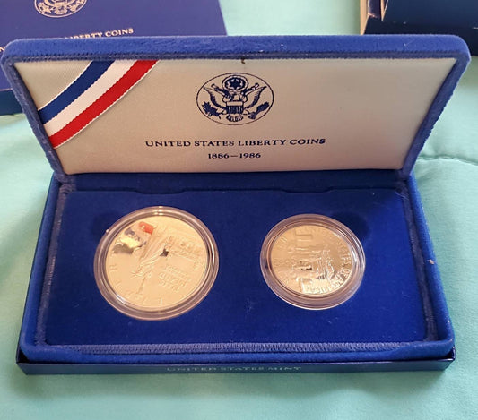 1986s statue of liberty two coin commemorative set including 90 percent silver proof dollar