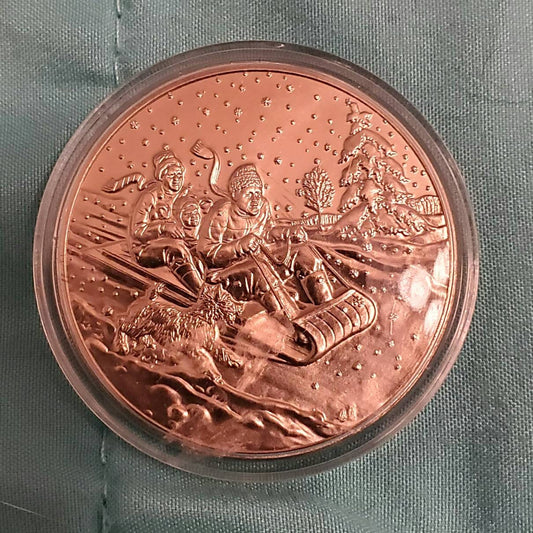 1 vintage silver colored holiday coin
