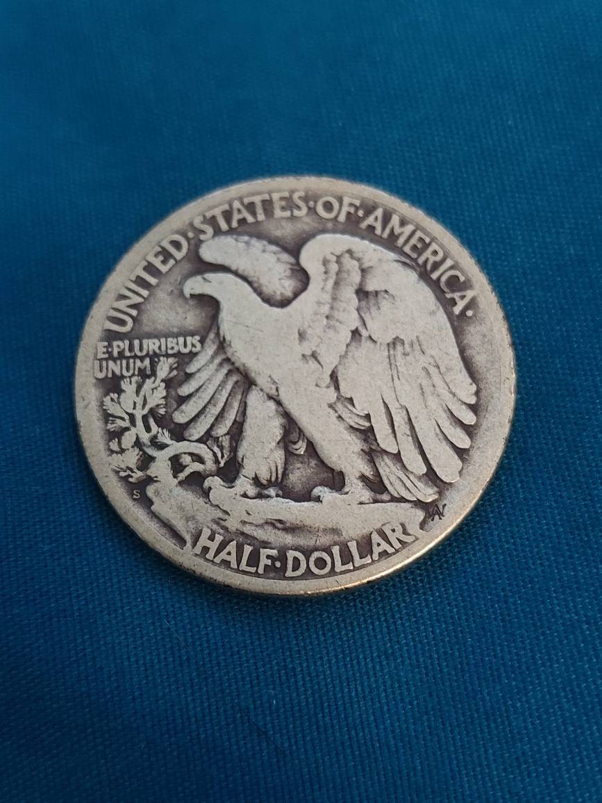 1918s walking liberty silver half dollar better early date