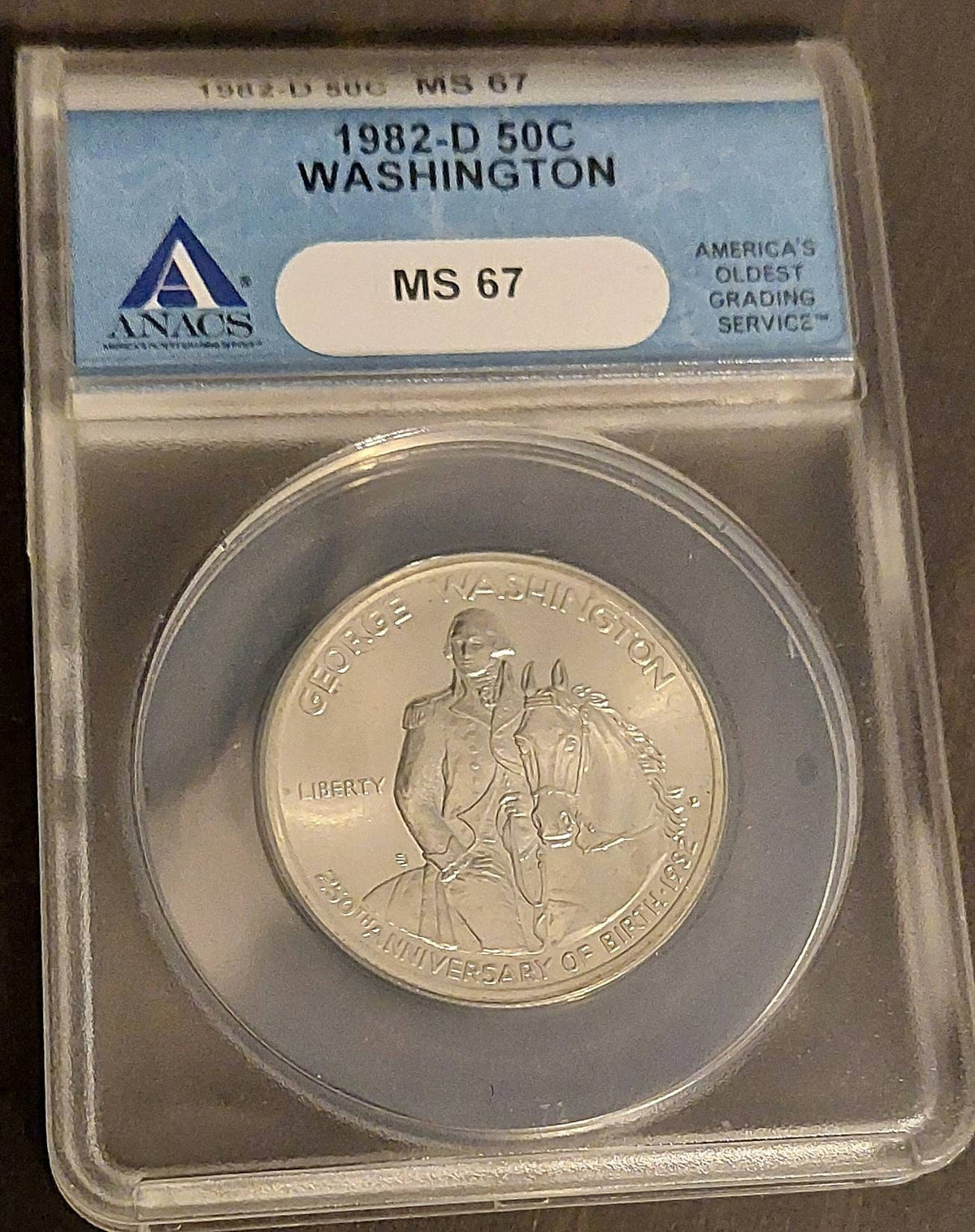 1982d Washington 50 cent commemorative silver coin, anacs graded ms67