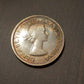 1953 Canada silver Canoe dollar, toned