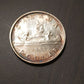 1953 Canada silver Canoe dollar, toned