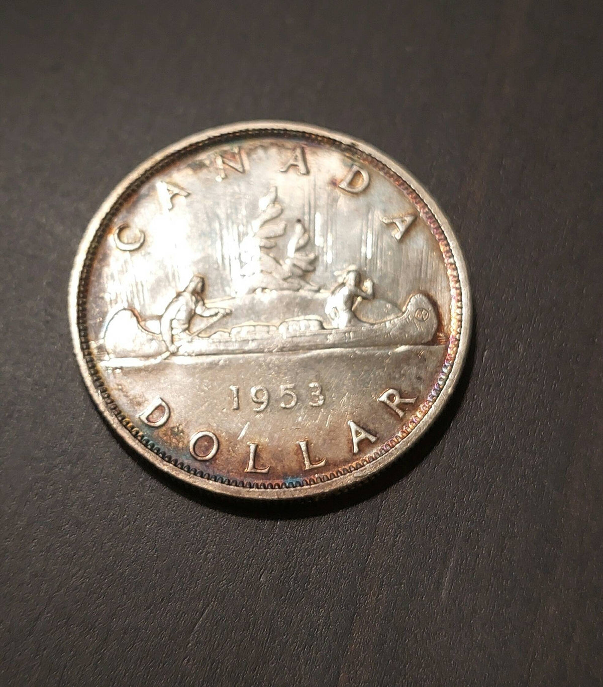 1953 Canada silver Canoe dollar, toned