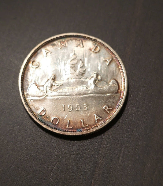 1953 Canada silver Canoe dollar, toned