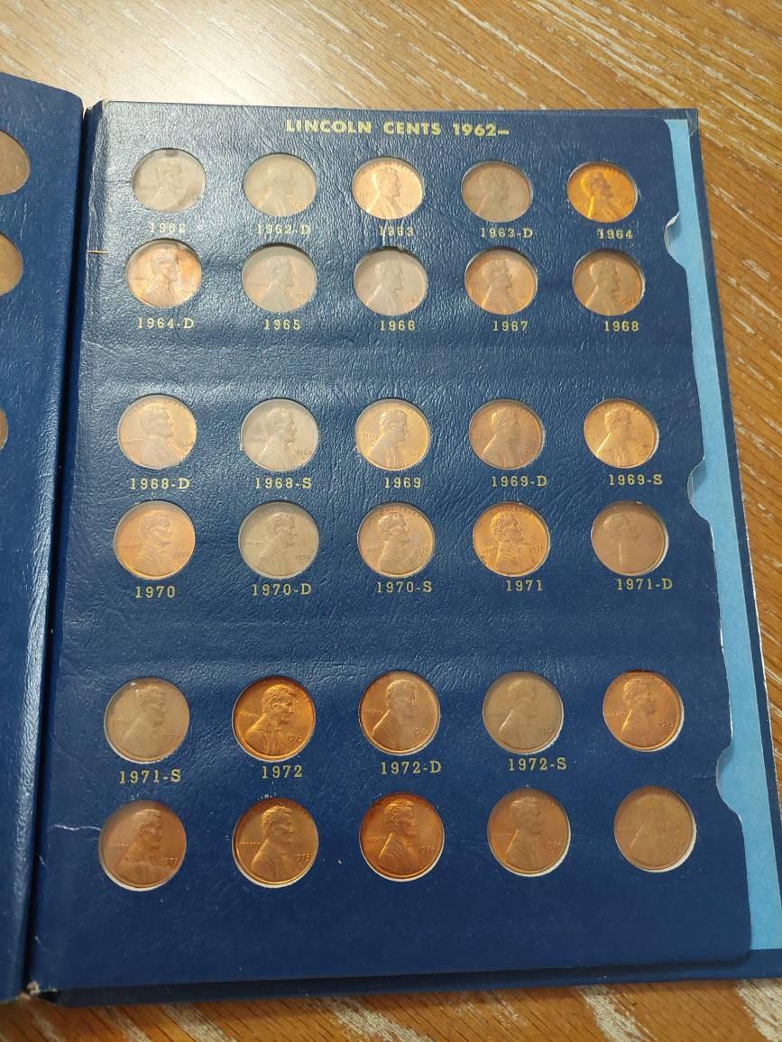 1941-1974 Lincoln cent collection,  in hard back old Whitman coin albulm has plastic sleeves. Only missing 1955s. A great collection