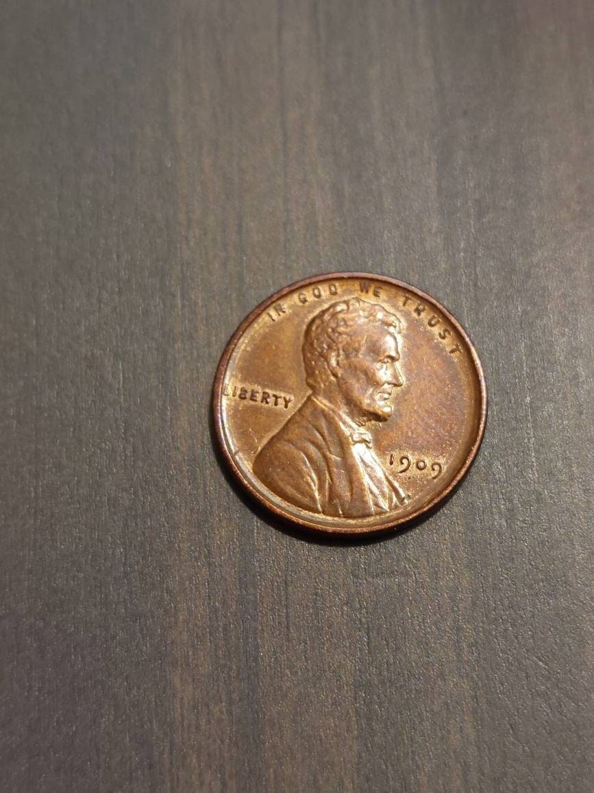1909p Lincoln wheat cent, first year old issue almost uncirculated