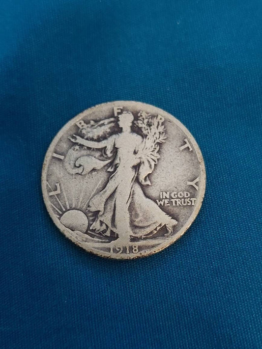 1918s walking liberty silver half dollar better early date