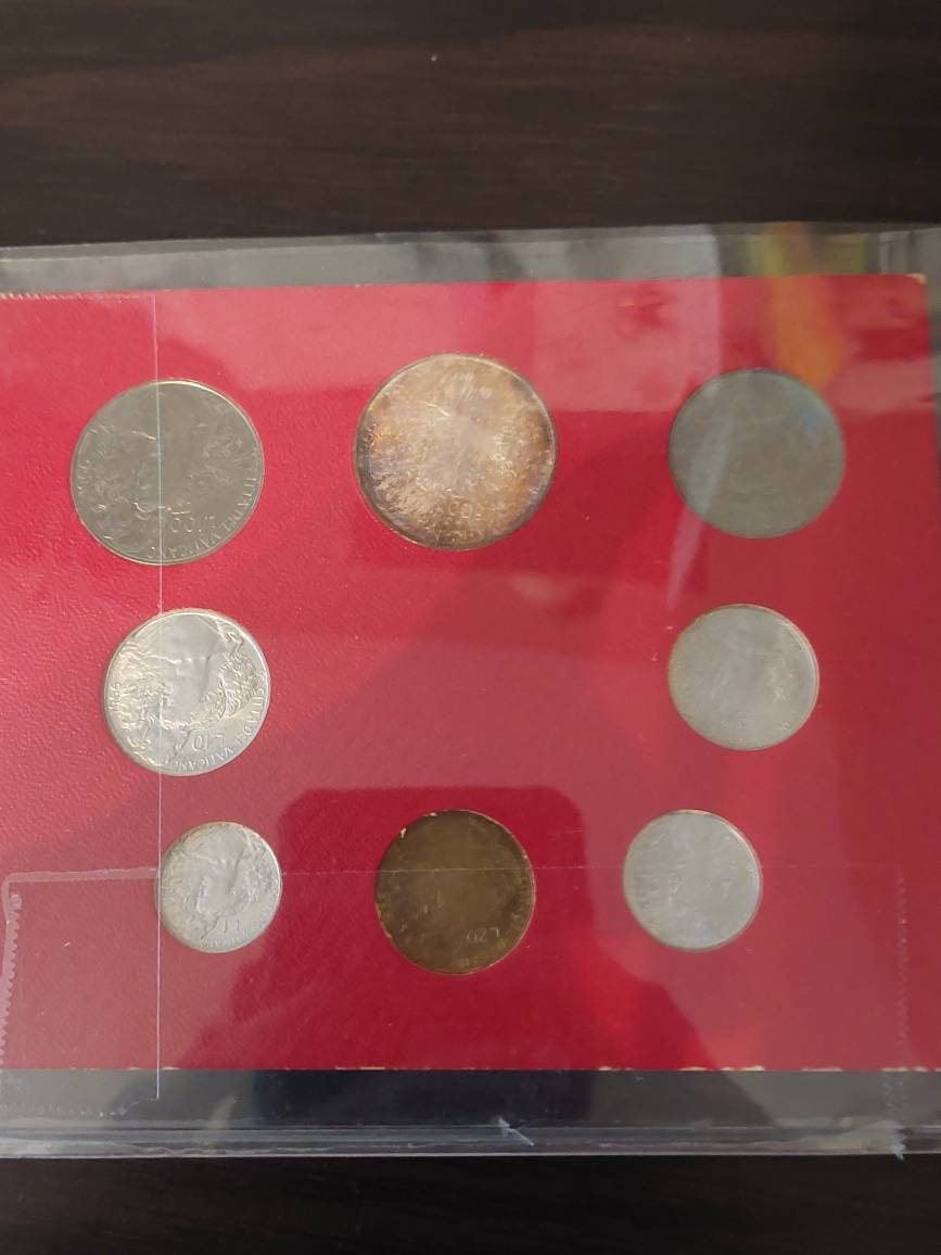 1966 vatican city, silver mint set. The pope silver coin has unbelievable toning