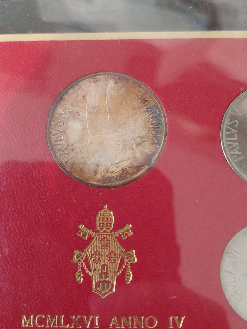 1966 vatican city, silver mint set. The pope silver coin has unbelievable toning