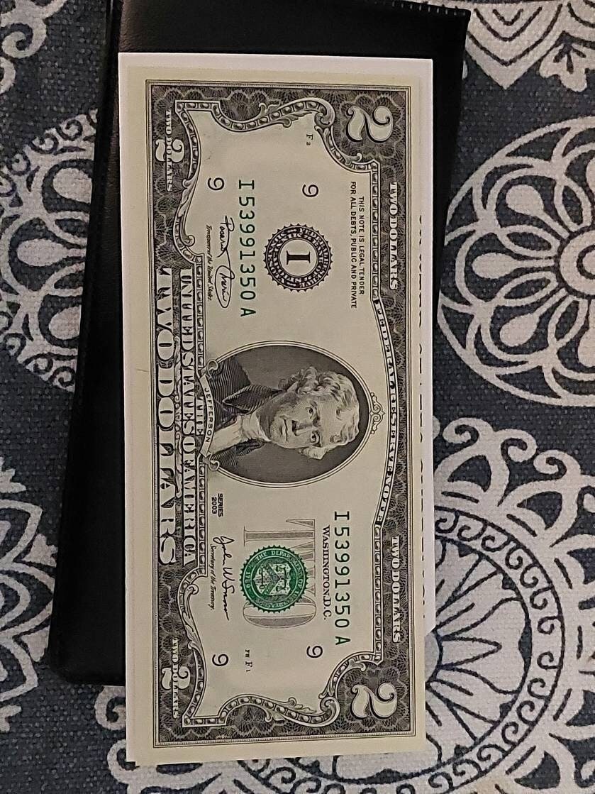 Uncirculated 2 dollar bill holder and coa, lovely percent condition unused 2 dollar bill
