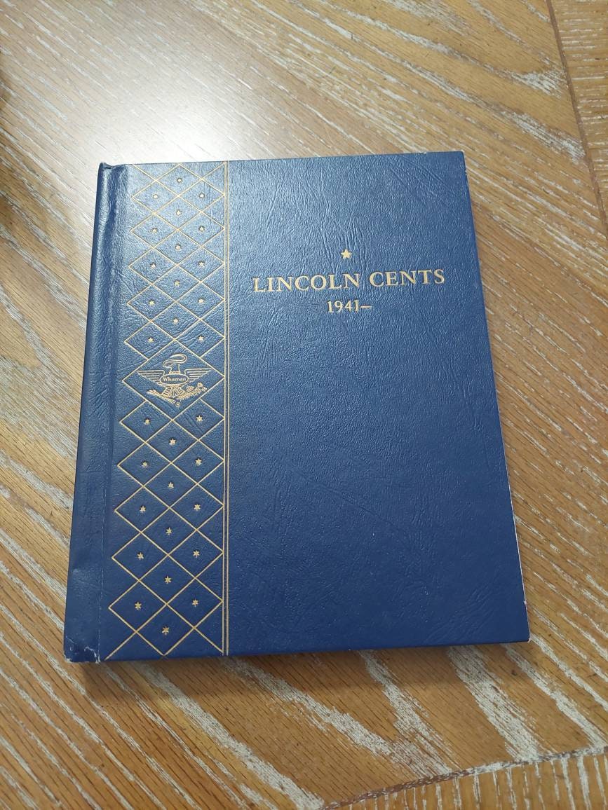 1941-1974 Lincoln cent collection,  in hard back old Whitman coin albulm has plastic sleeves. Only missing 1955s. A great collection