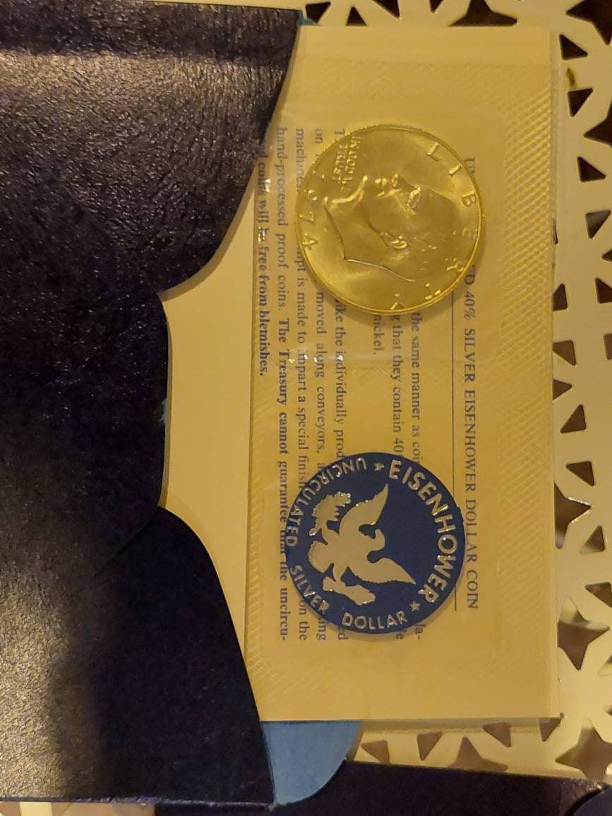 Eisenhower dollar ike, "blue ike" 1970s silver dollar 40percent silver  in mint envelope, us coin collecting ike dollar