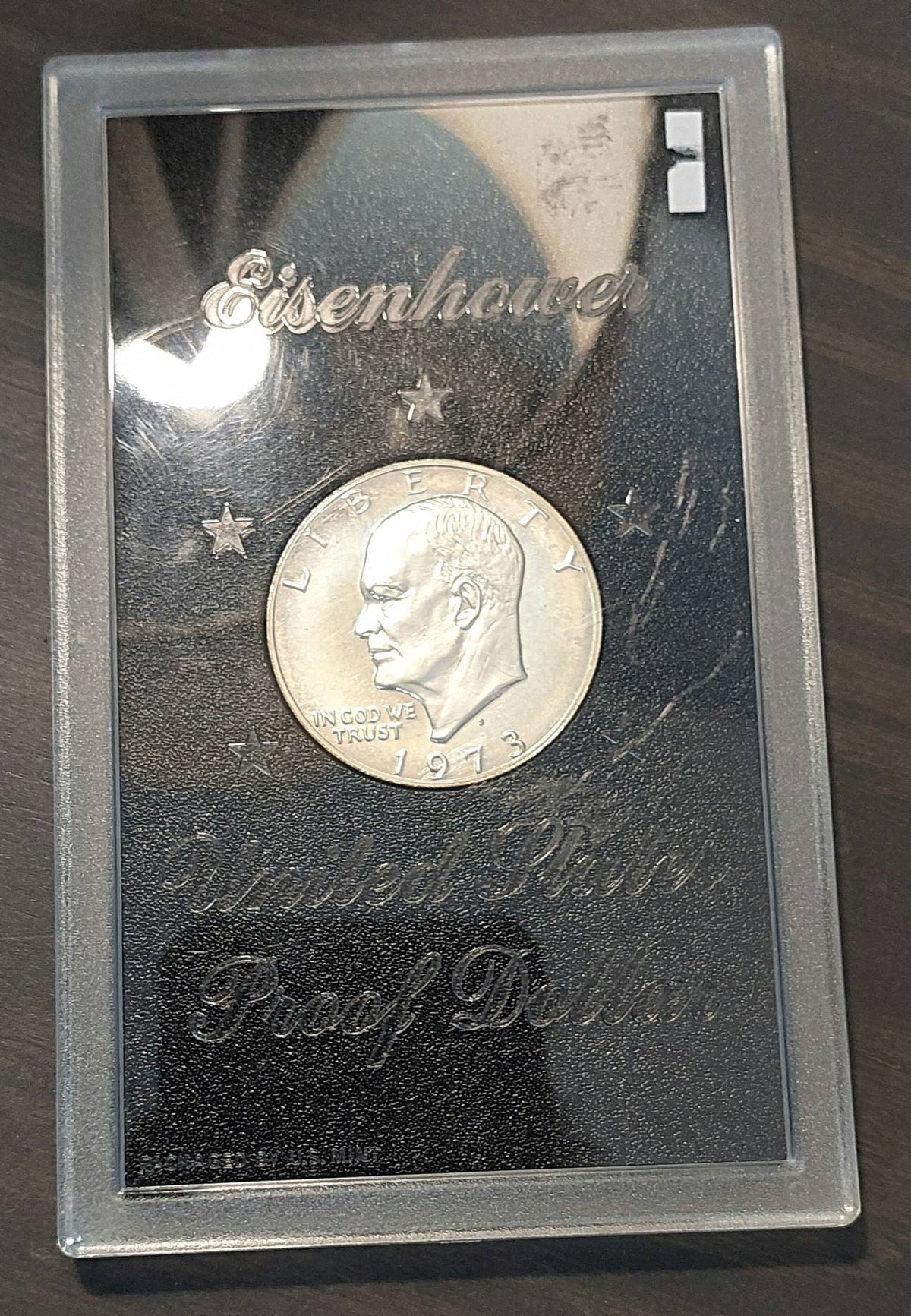 1973s proof silver Eisenhower dollar, in original government holder