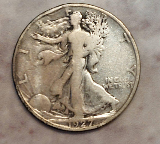 1927s walking liberty half dollar, Scarce better date low mintage in very good condition