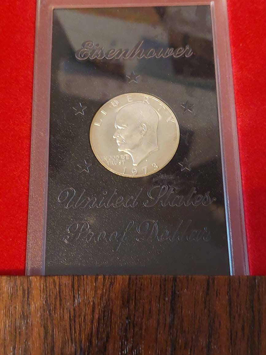 1973s proof silver Eisenhower dollar, in original government holder