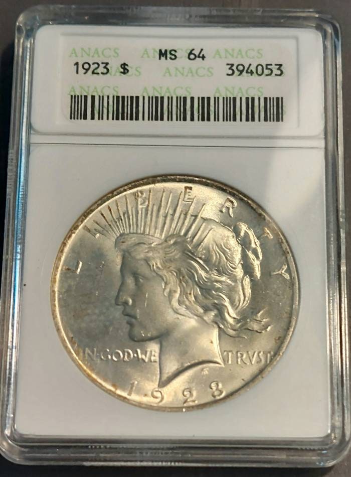 1923 silver peace dollar, graded ms64 brilliant uncirculated,  in old anacs soapbox holder,  coin collecting, free shipping