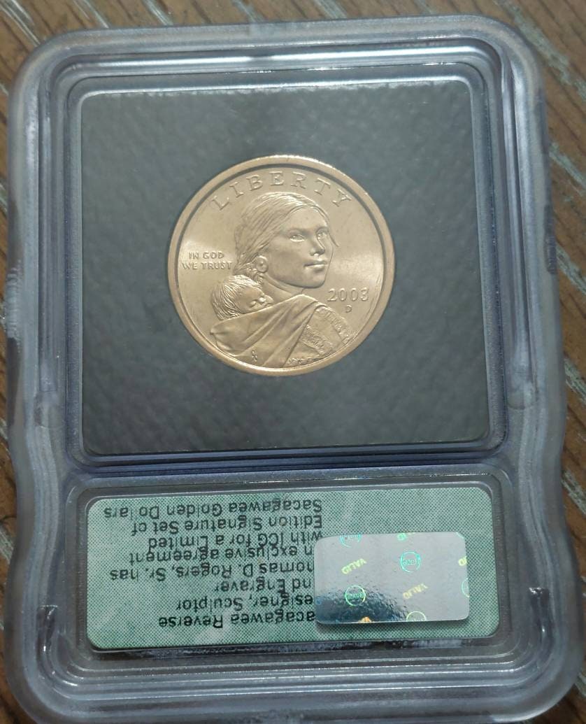 2003d Sacagewa dollar coin, low mintage date ICG grades ms66 signature label series