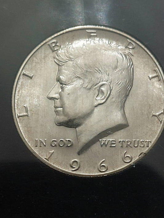 1966 Kennedy half dollar, 40 percent silver coin graded ms65 by third party grader, double profile variety