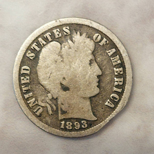 1893s barber silver dime, Scarce early date, a good coin. Planchet flaw or post mint damage I don't know..