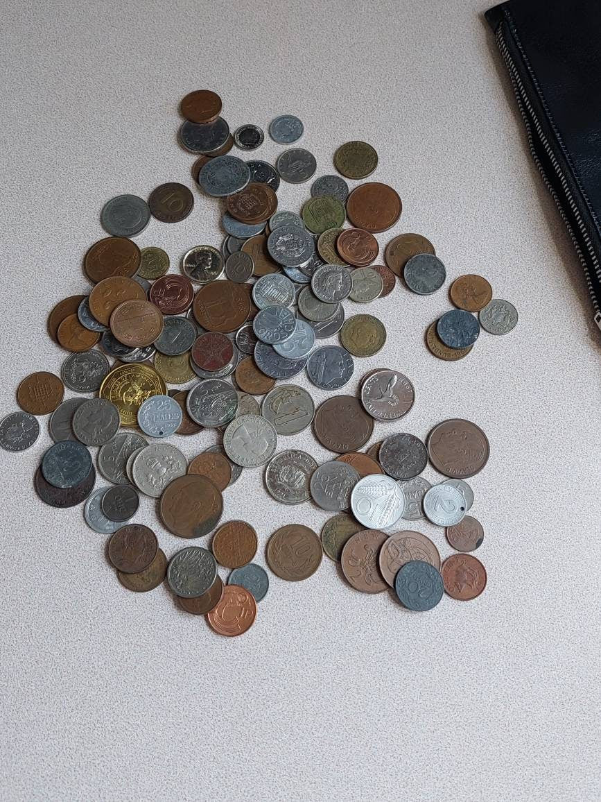 115 huge foreign coin lot includes silver, Europe,  Asian, America's, from 1900s to 1990s, coin crafts and collection,  comes with black bag